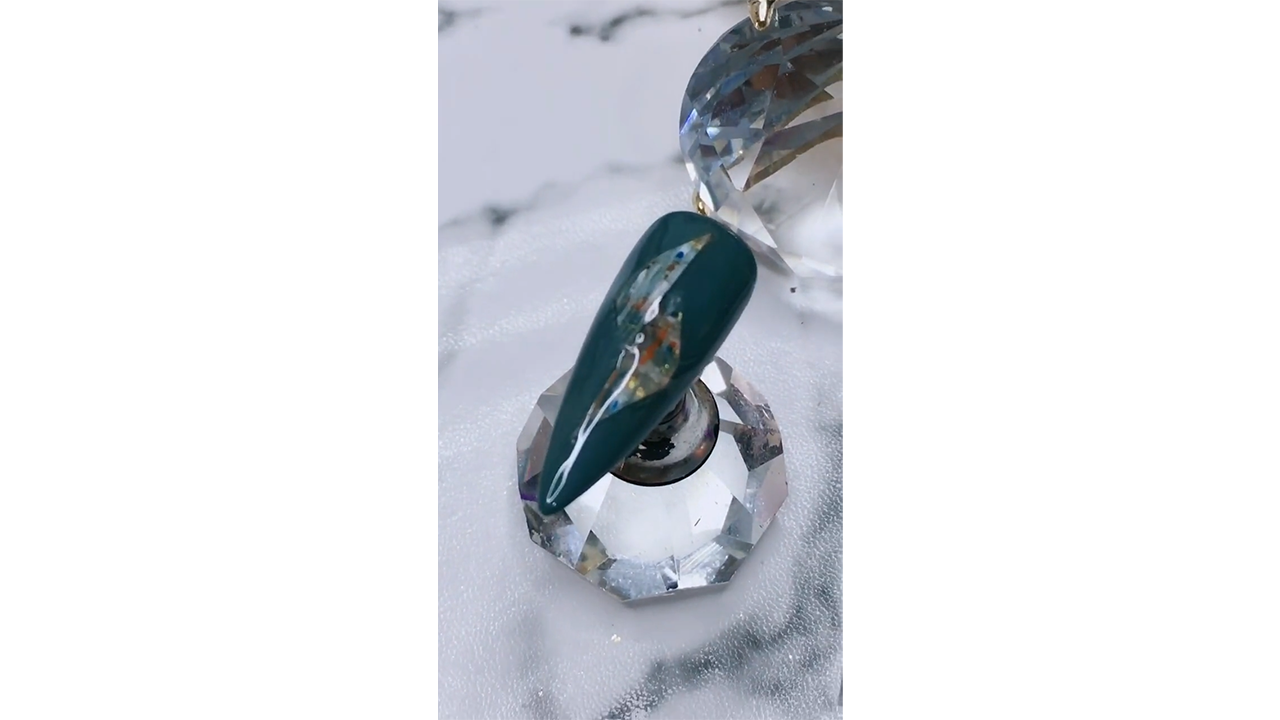 Creating deep emerald green nails with iridescent crystal effect