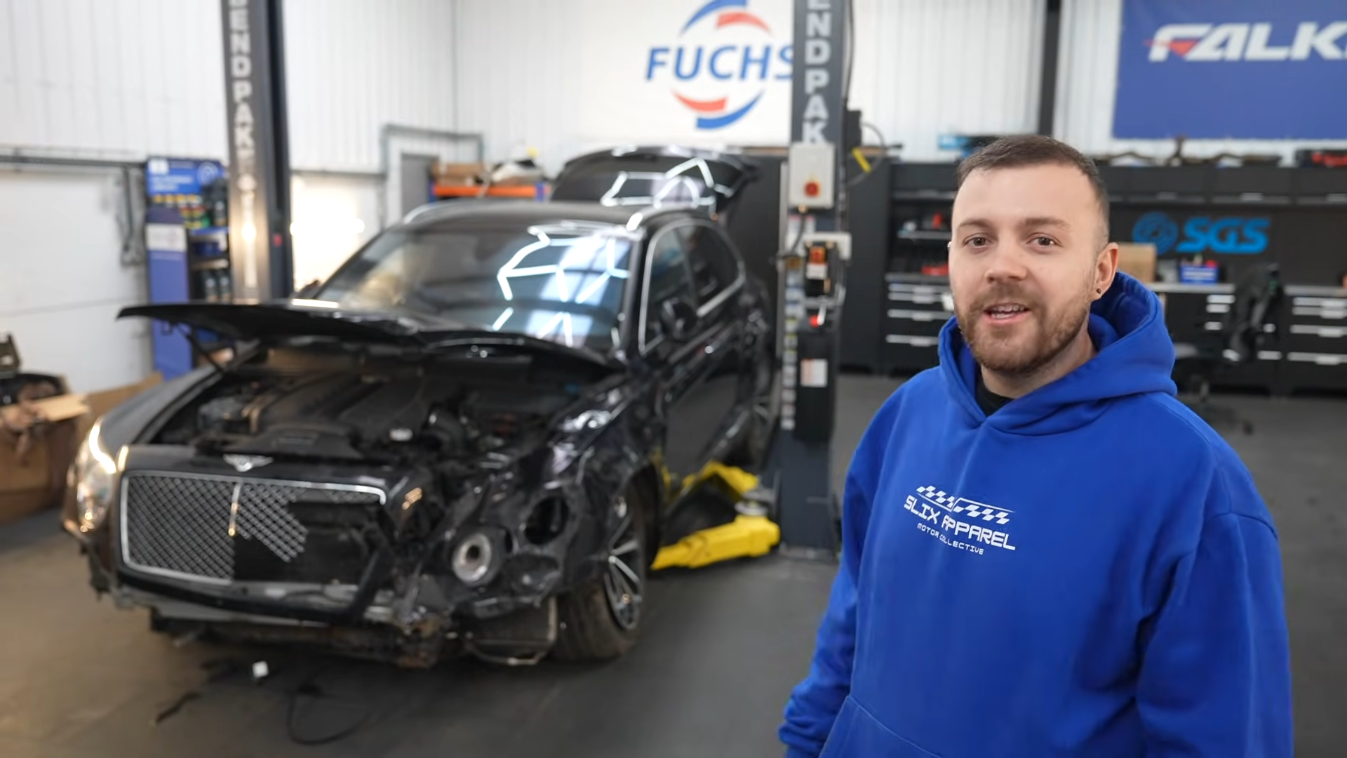 A destroyed W12 Bentley Bentayga gets inspected