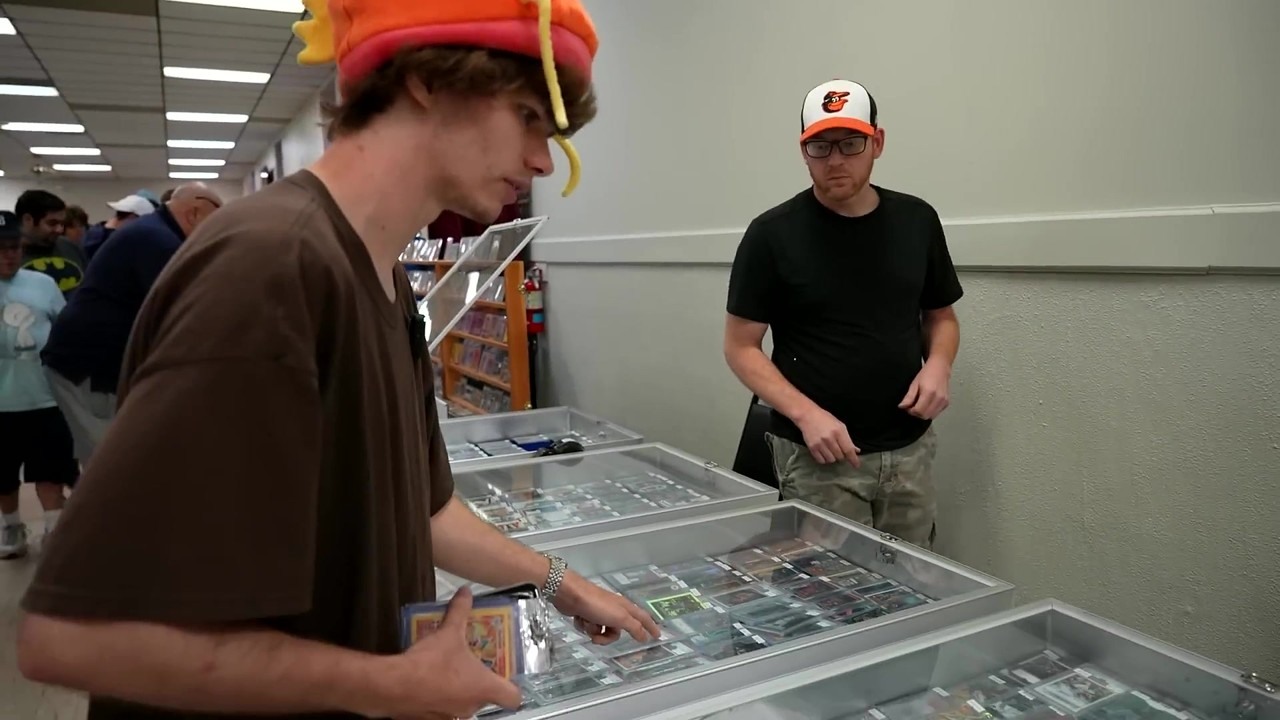Connor trades Pokémon cards from a fan mystery box at Livonia Elks Club
