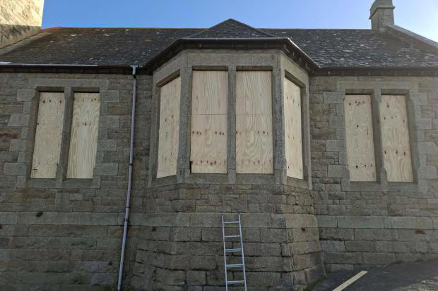 Porthleven’s iconic Bickford Smith Institute boarded up as Storm Austen ...