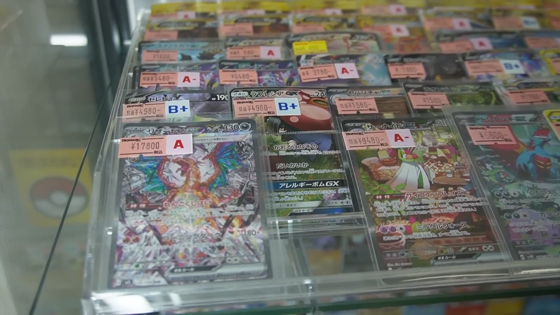 Connor finds Charizards and a poncho Pikachu card in Tokyo