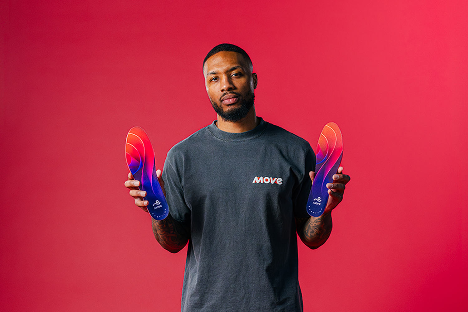 Lillard and his new Move Insoles, which he says will provide players "support and different options." (Courtesy Move Insoles)
