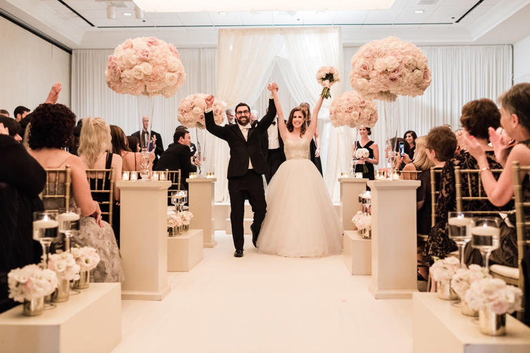 Nicole Leon and Larry Leon on their wedding day on Aug. 18, 2018, a year and a half after Nicole Leon's cancer removal surgery.