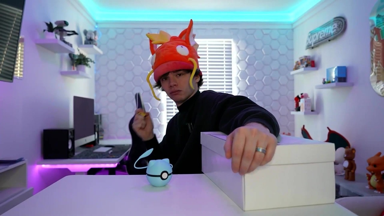 Connor opens a Pokémon mystery box with a first edition Raichu