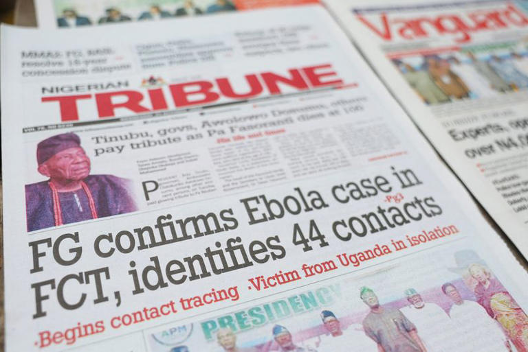 A newspaper's front page carrying a headline about a reported Ebola case in Nigeria's capital, Abuja, is displayed at a newspaper stall in Lagos, Nigeria, October 21, 2026. REUTERS/Sodiq Adelakun