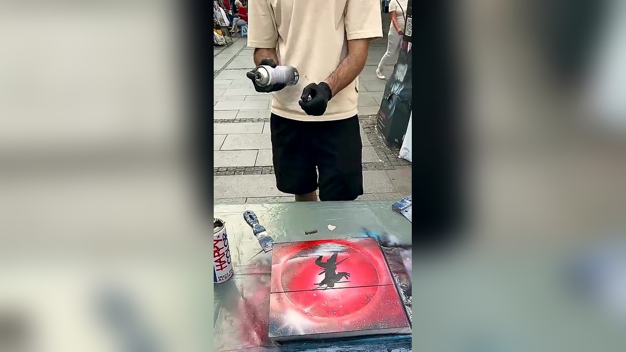 Spray painting a thrown-out PS4