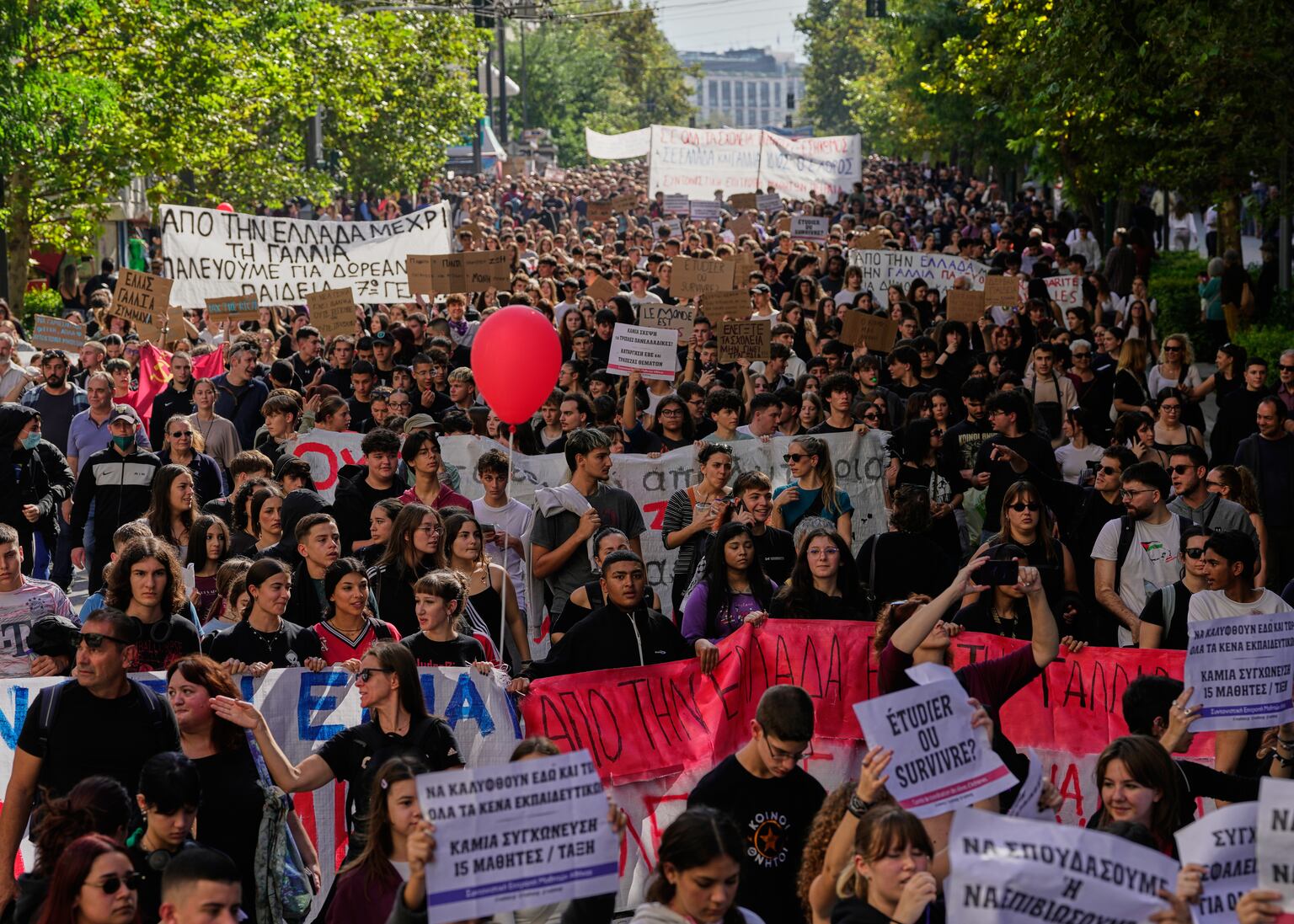 Students and teachers march through Greek capital in protest over cost ...