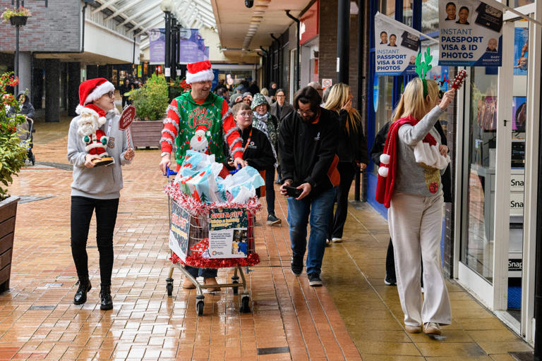 11 photos capture festive fun of trolley dash to launch Burnley ...