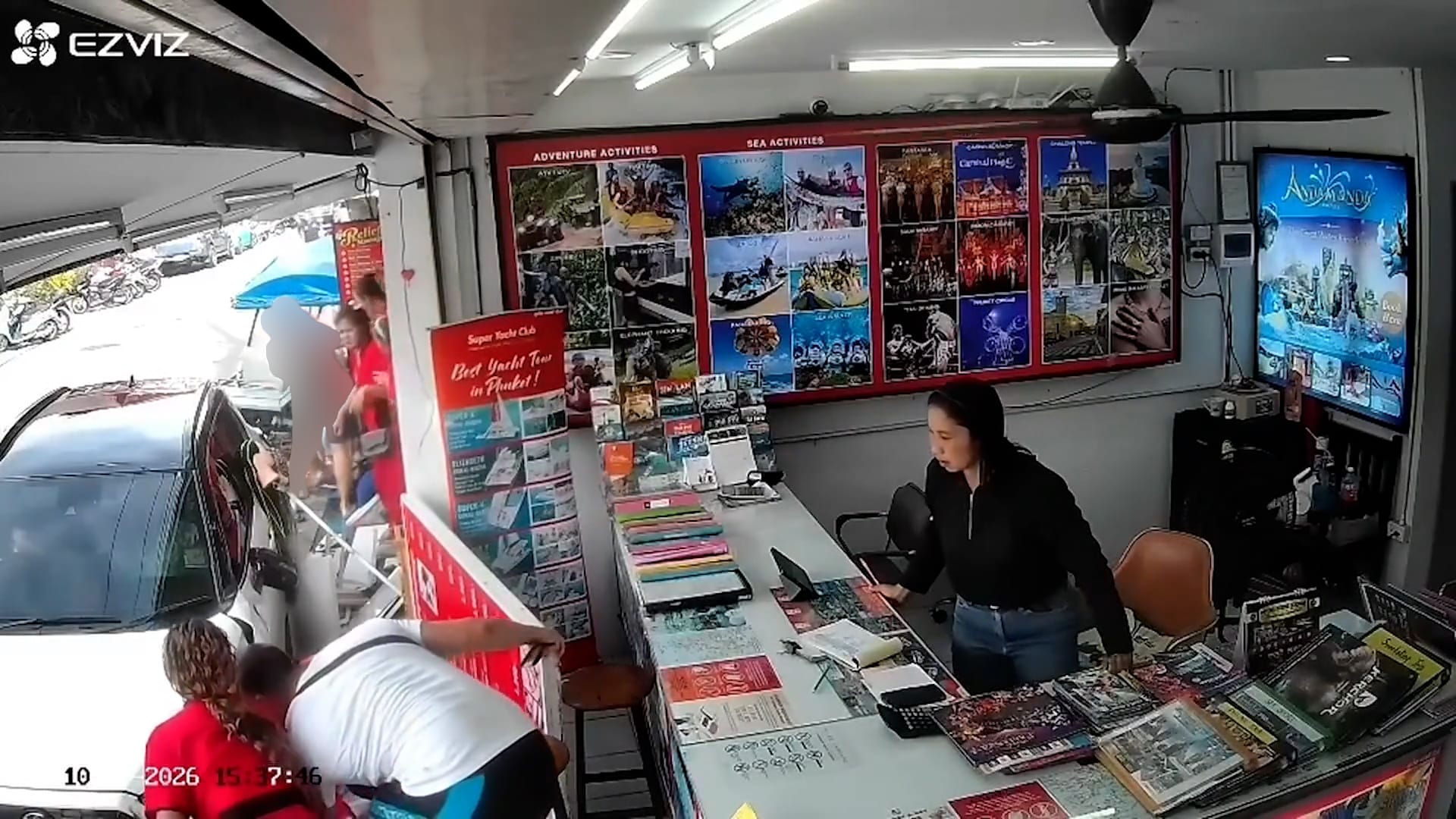 Mother shields children as car crashes into food stall in Thailand
