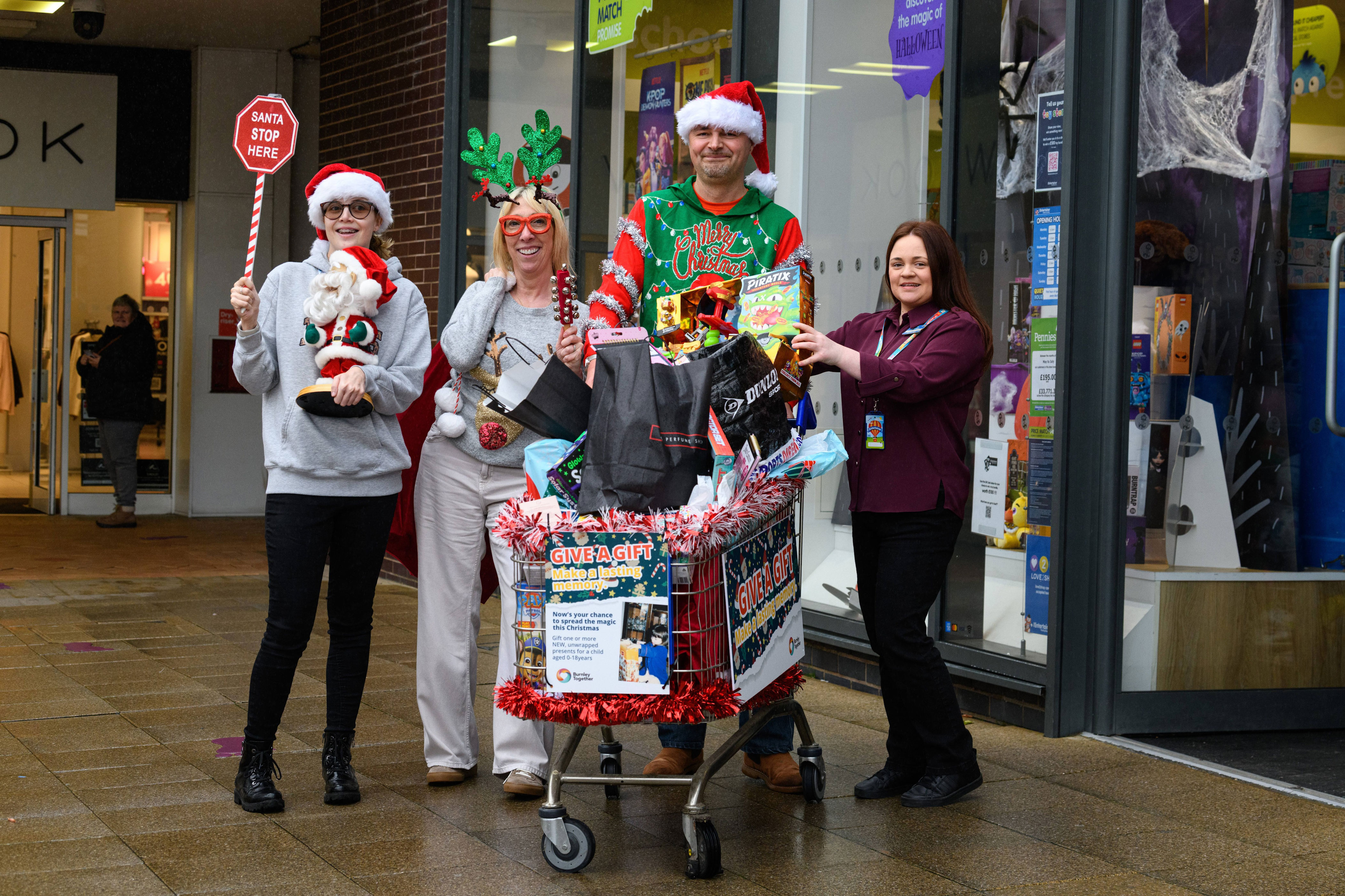 11 photos capture festive fun of trolley dash to launch Burnley ...