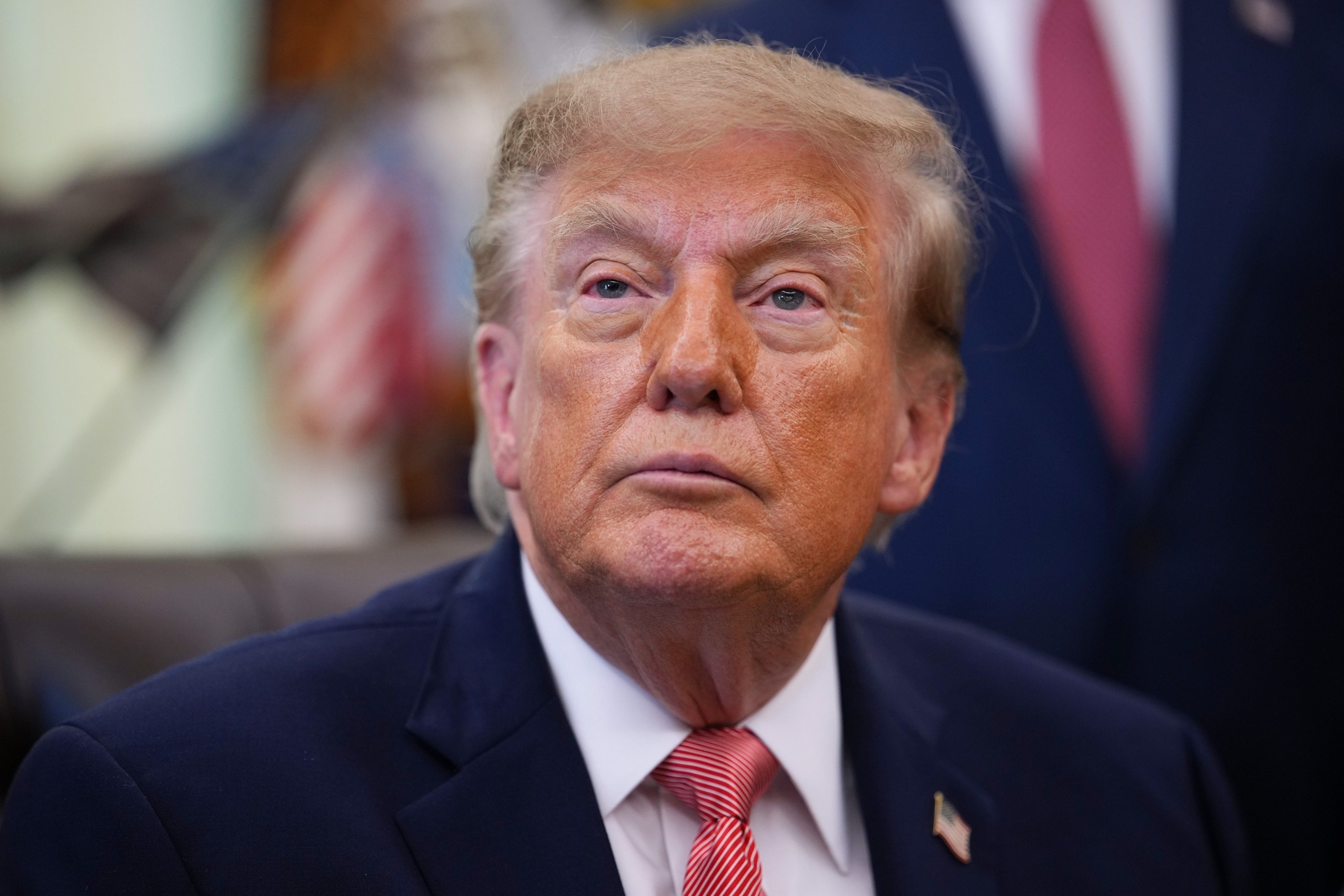 Andrew Harnik/Getty Images - PHOTO: President Donald Trump speaks to reporters about efforts to crack down on taxpayer fraud in the Oval Office of the White House in Washington, October 26, 2026.