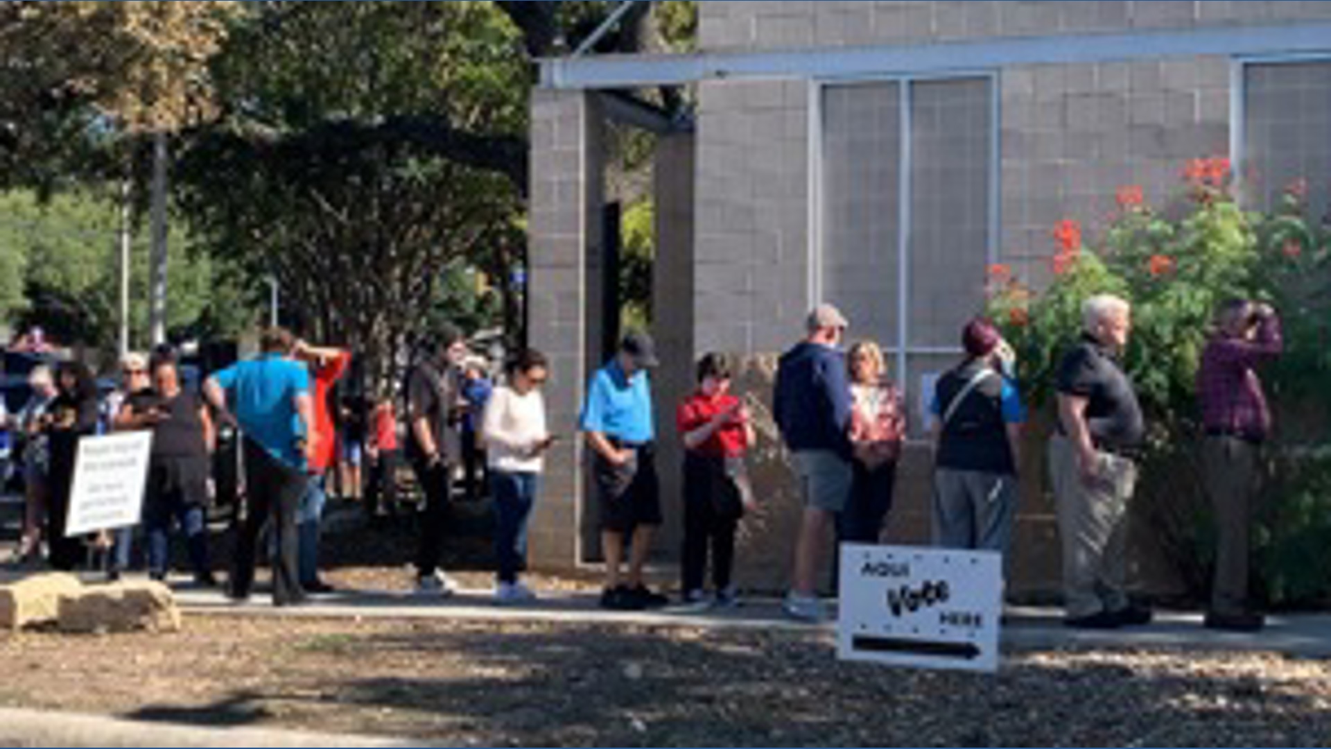 Long line for early voting at Brook Hollow Library