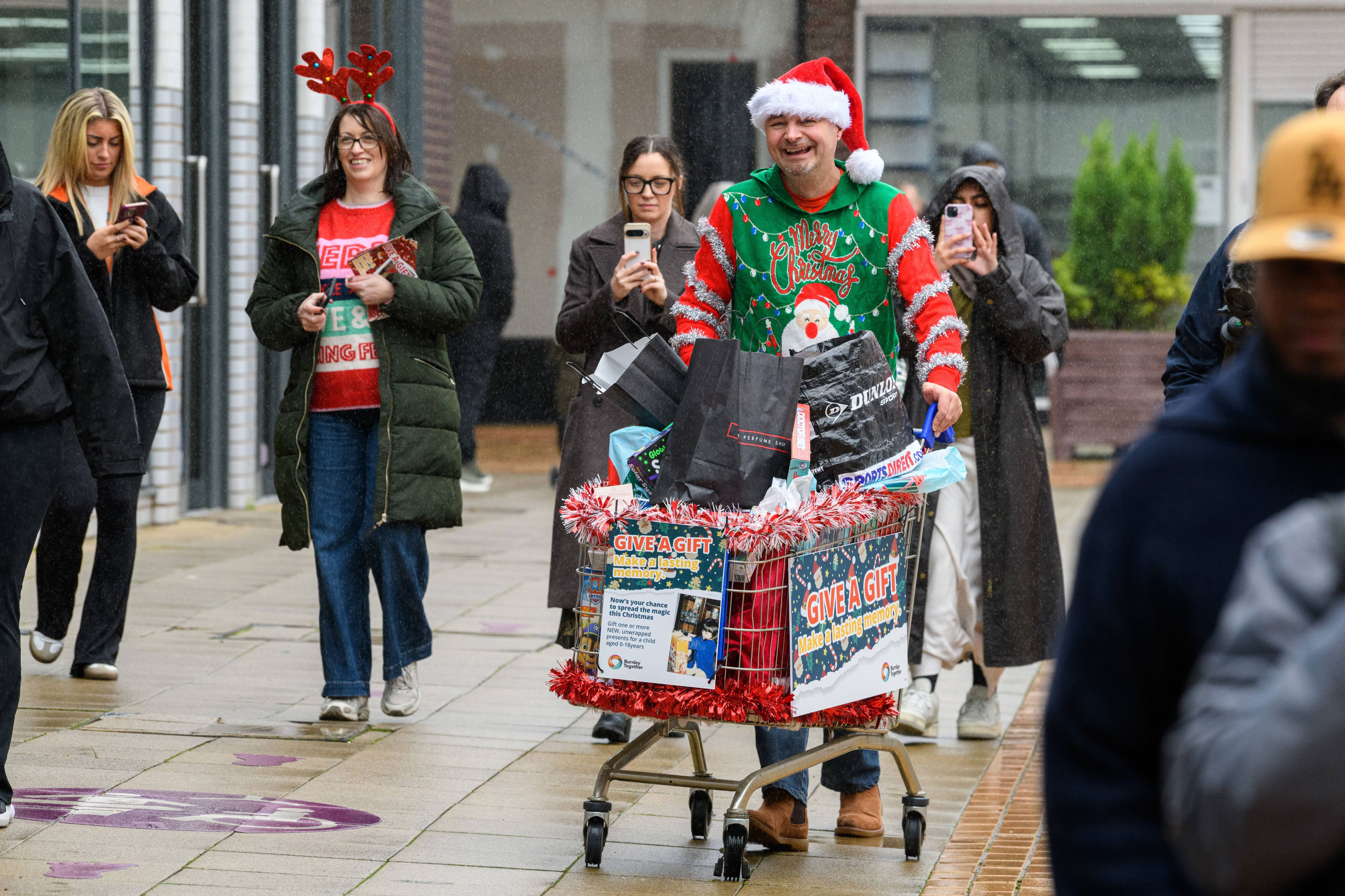 11 photos capture festive fun of trolley dash to launch Burnley ...
