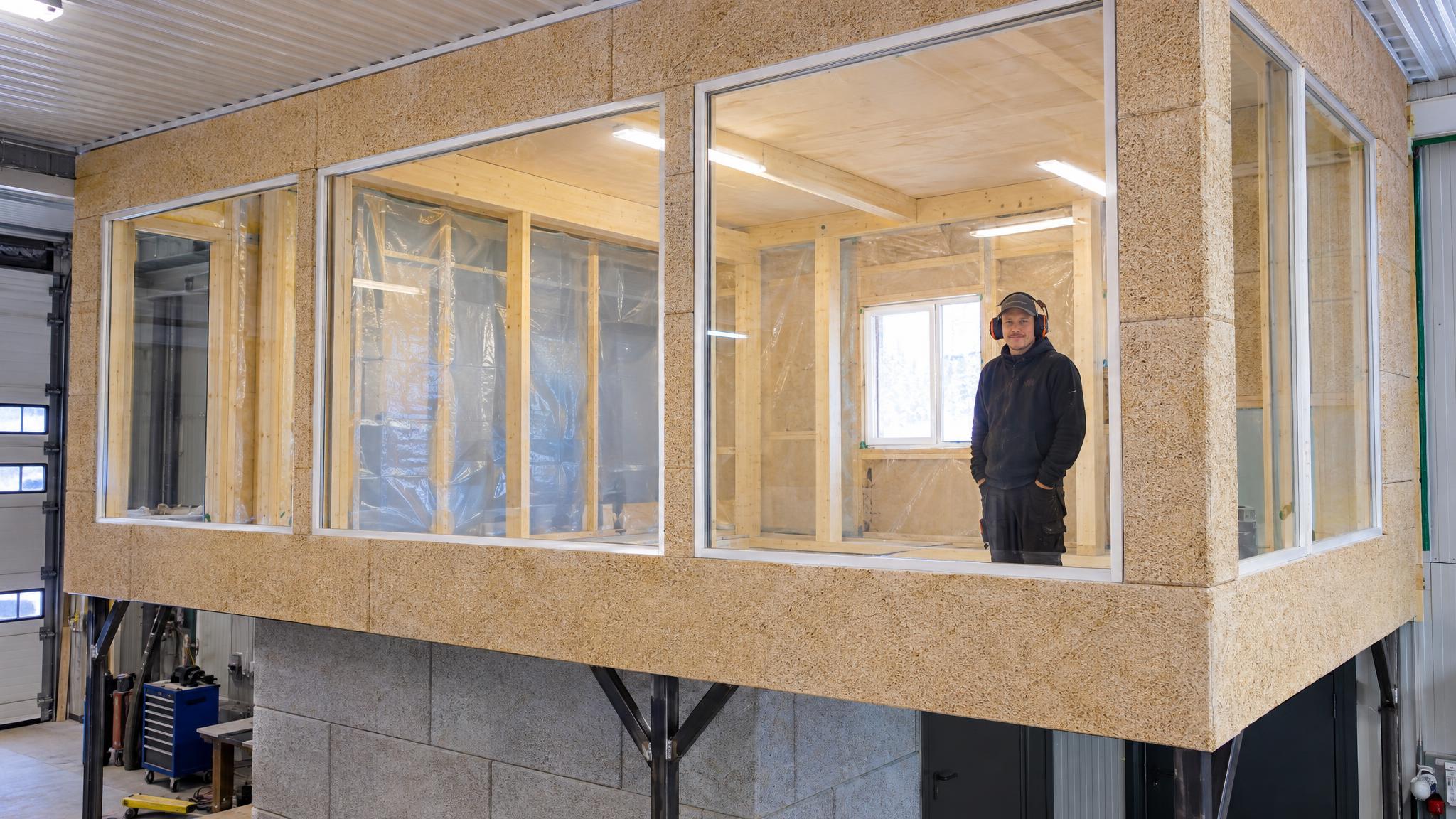 Building a garage office with large windows creates a separate ...