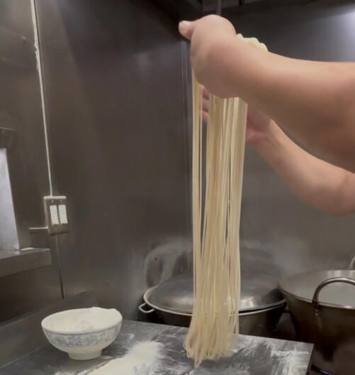 Hand-pulled noodles with a side of baby grand piano in Monterey Park