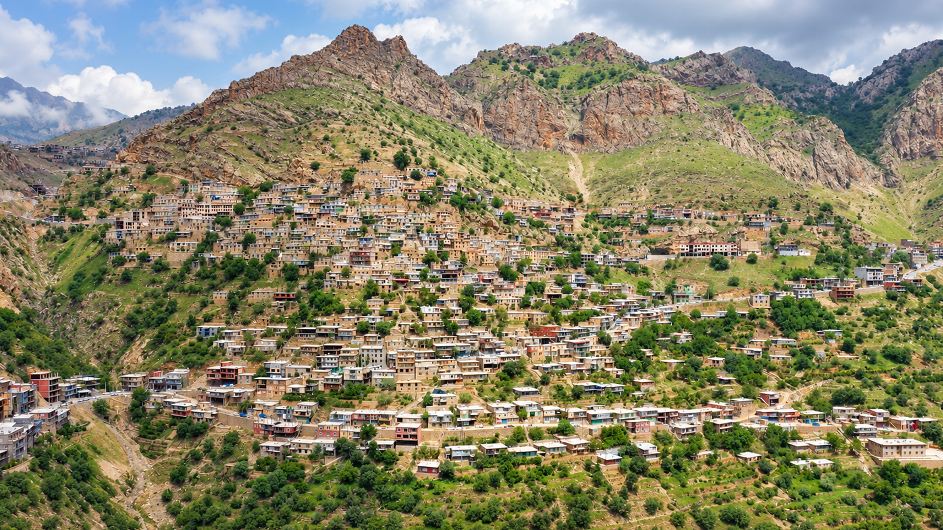 Hundreds of houses climbing a steep hillside in Iran