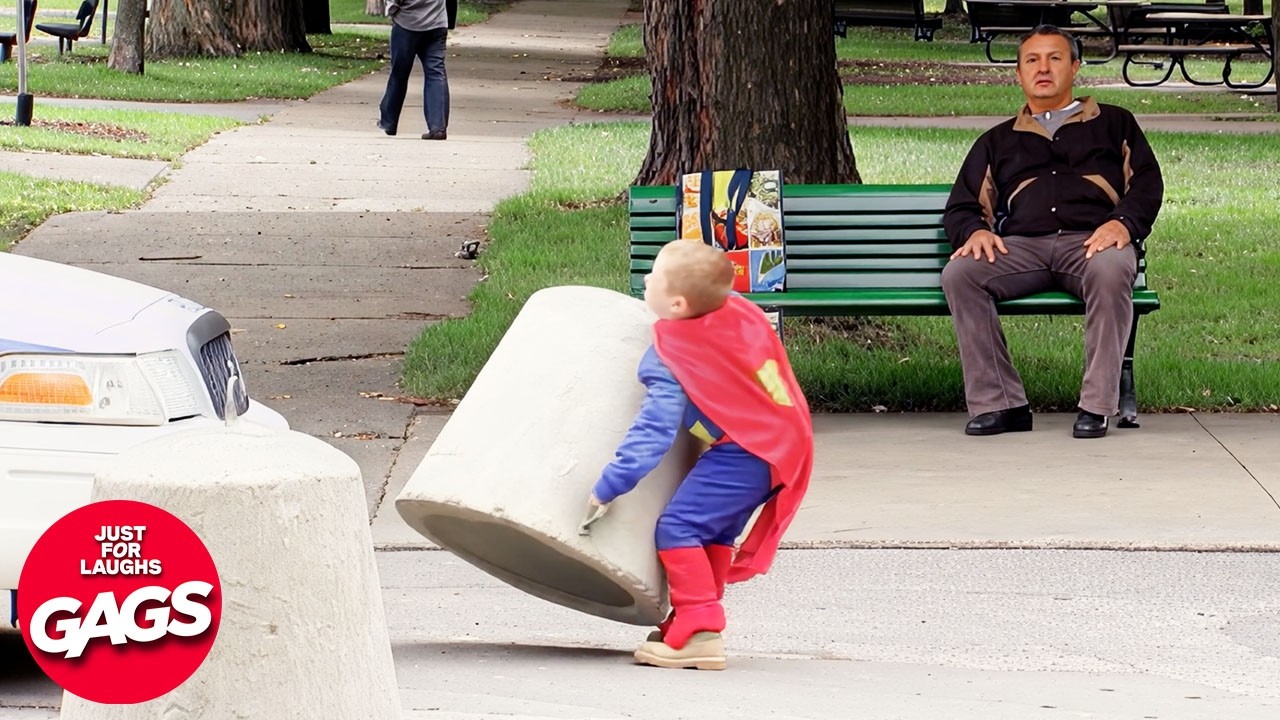 Superman boy tries to move concrete barrier in park | Just for Laughs Gags