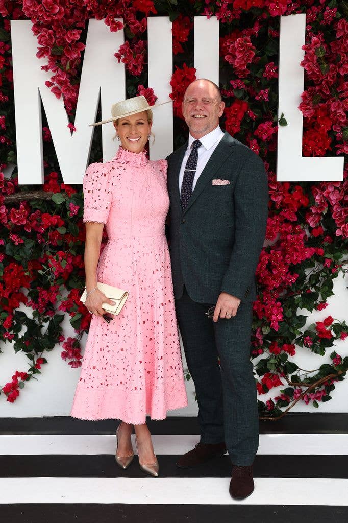 Mia Tindall is mum Zara's mini cheerleader as she patiently waits for a ...