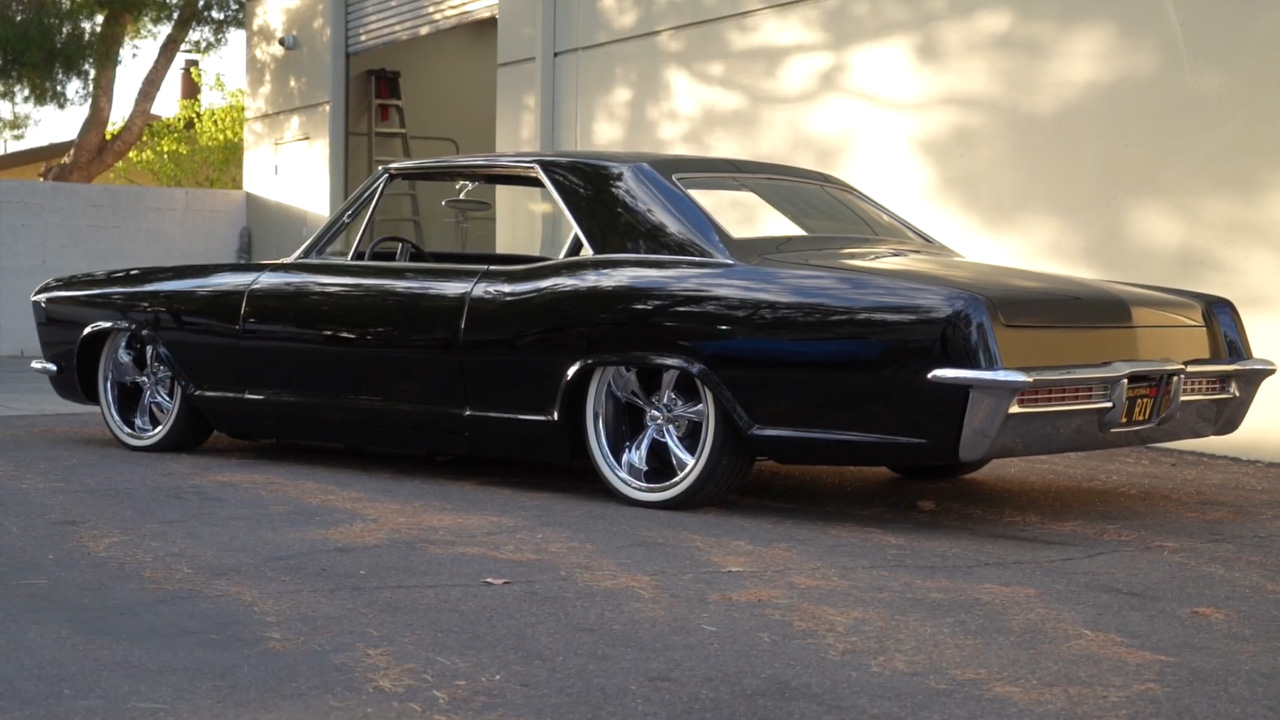An old '65 Buick Riviera cruiser that sits low on air suspension