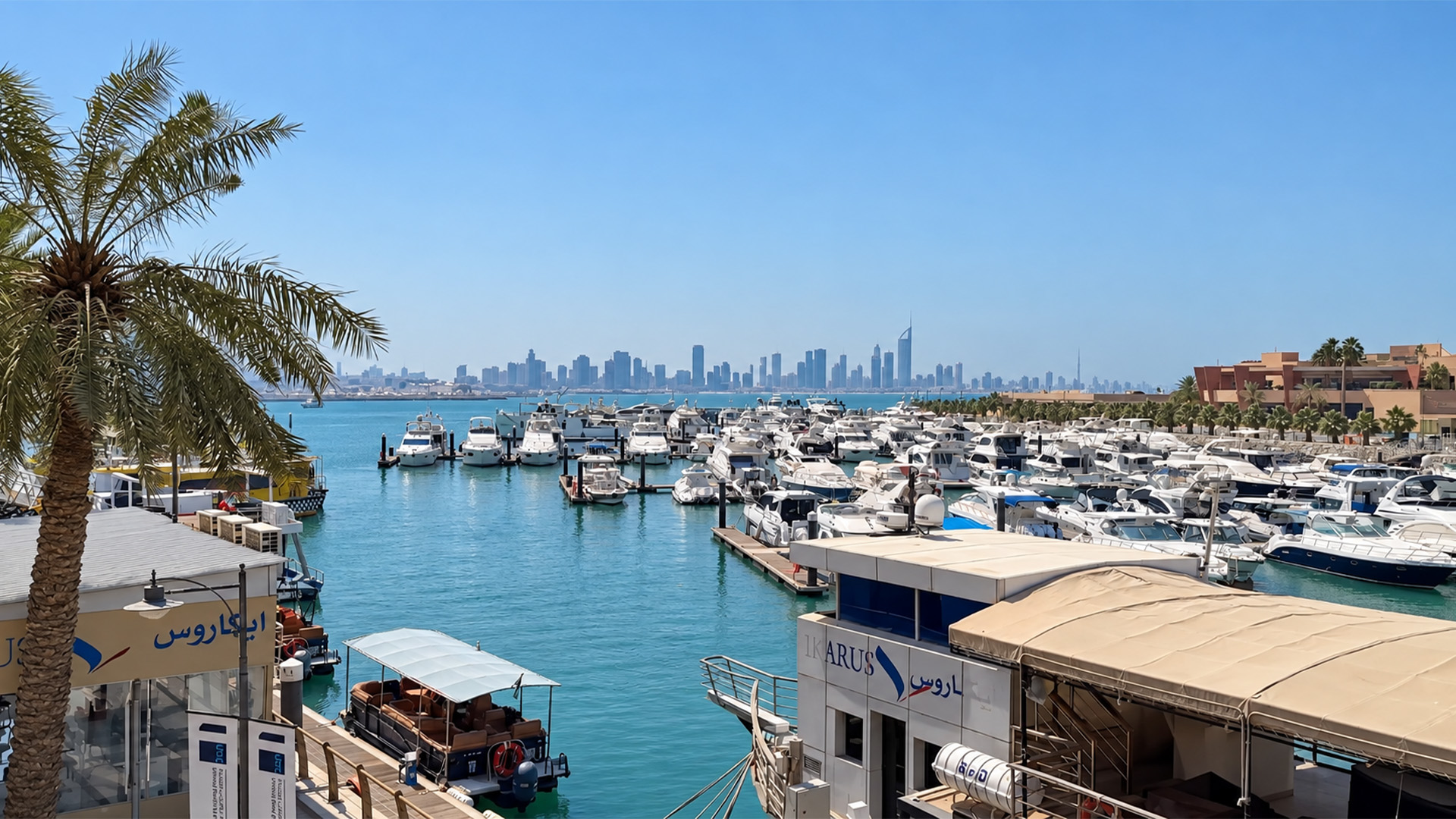 Yachts gather along Kuwait City’s bright waterfront