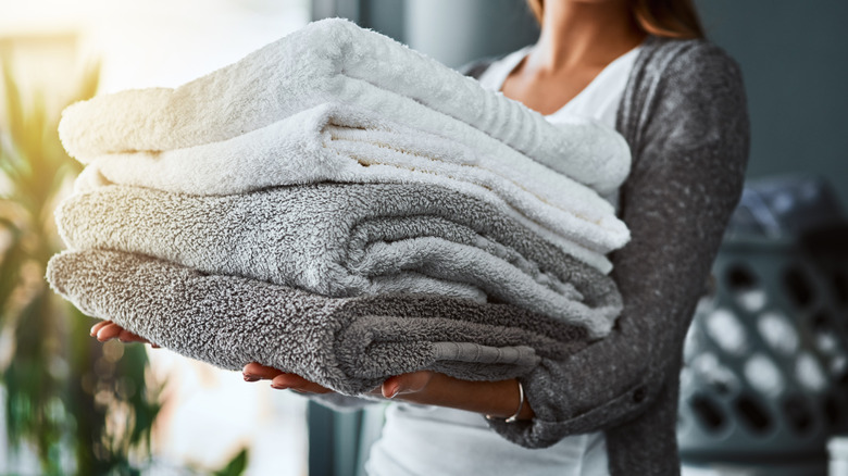 10 affordable Dollar Tree solutions to keep your towels tucked away and organized