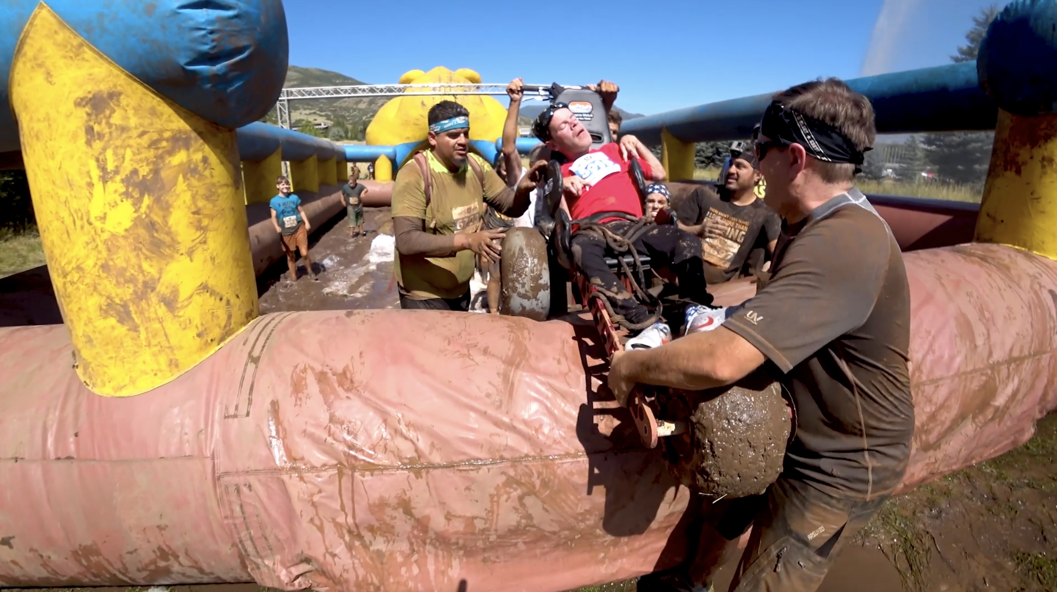 Friends help man in wheelchair complete 5k obstacle race | Happily