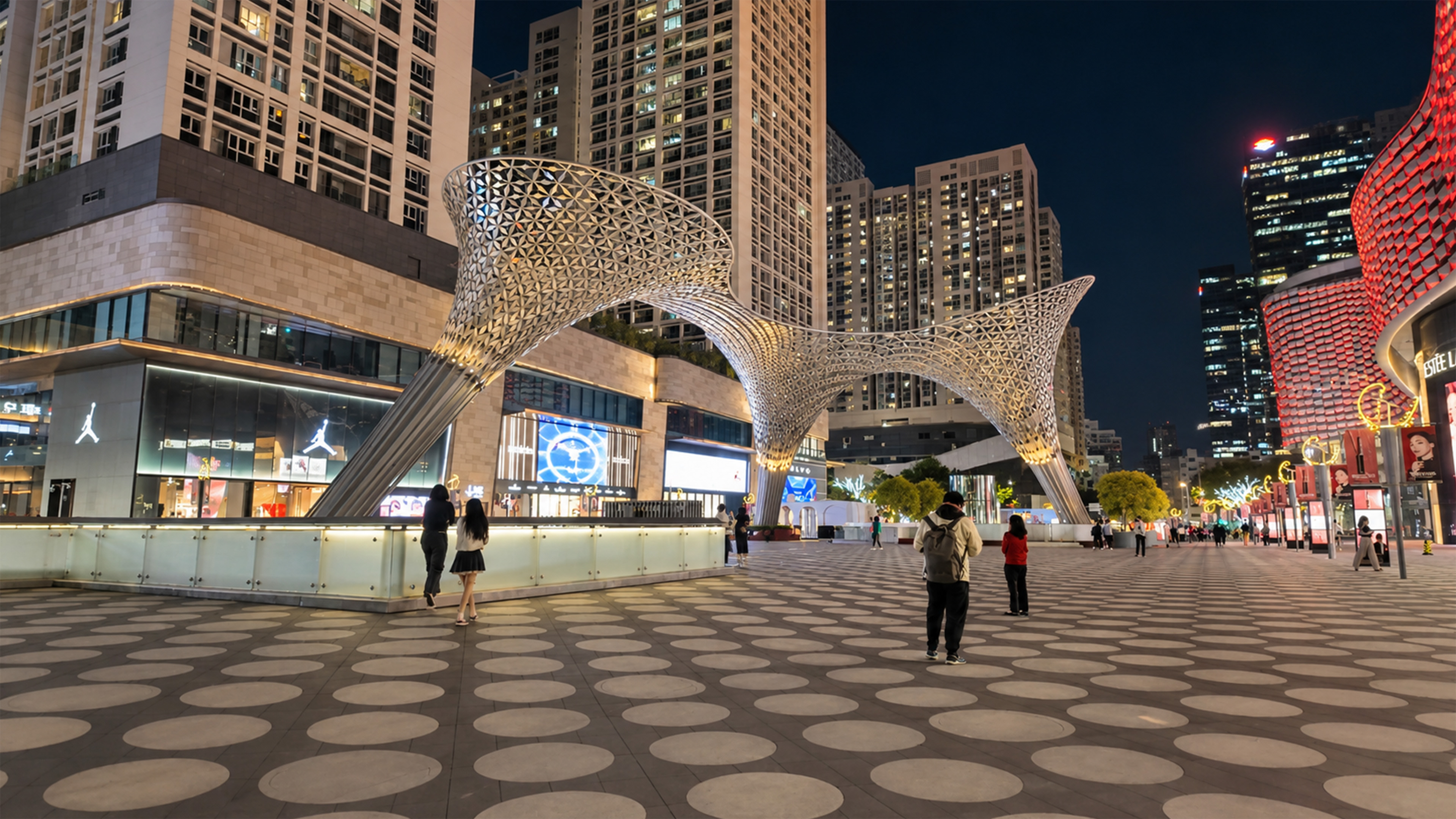 A giant woven metal structure stretches across Shenzhen's shopping plaza