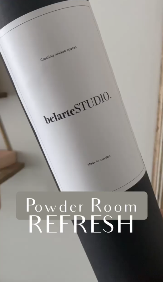 Bold wallpaper transforms a small powder room