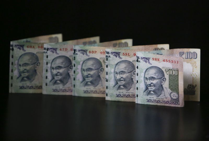Rupee snaps eight-day rally as oil climbs to highest since May