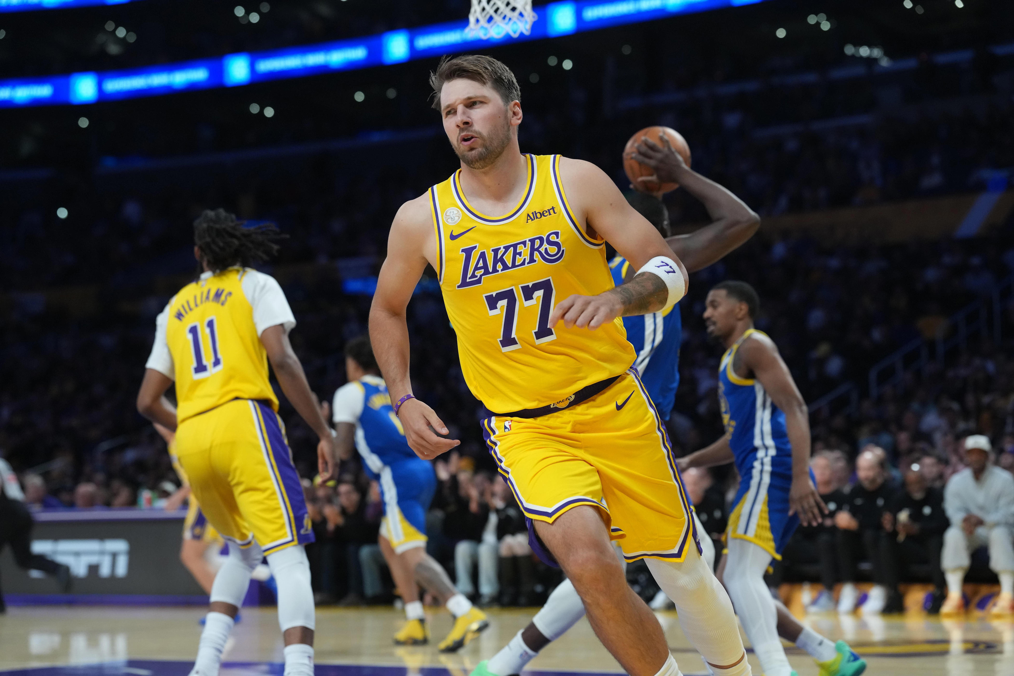 Luka Dončić makes halfcourt shot before halftime in Lakers' season opener
