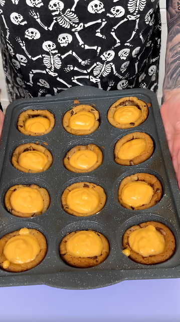 Bake soft chocolate cookie muffins with sweet pumpkin filling