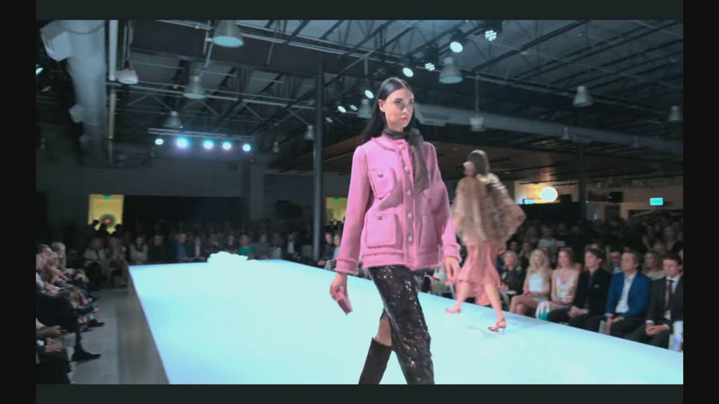 Rev the Runway in Denver combines high-end fashion with luxury vehicles