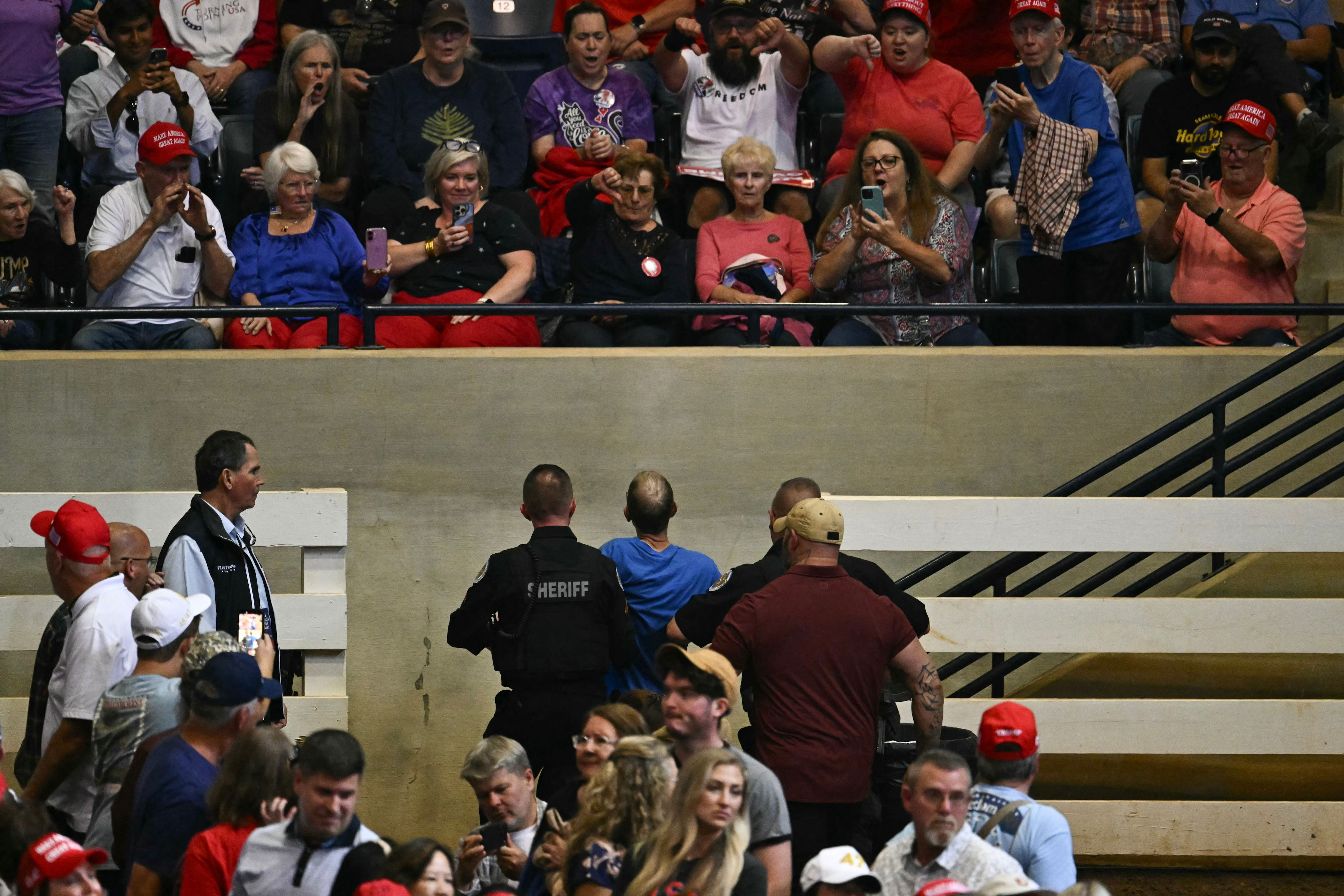 Trump cheers on violent attacks on protesters at chaotic rally