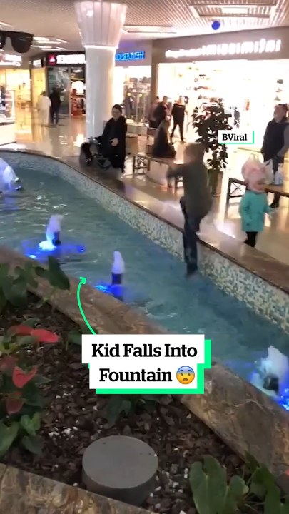 Kid falls into fountain