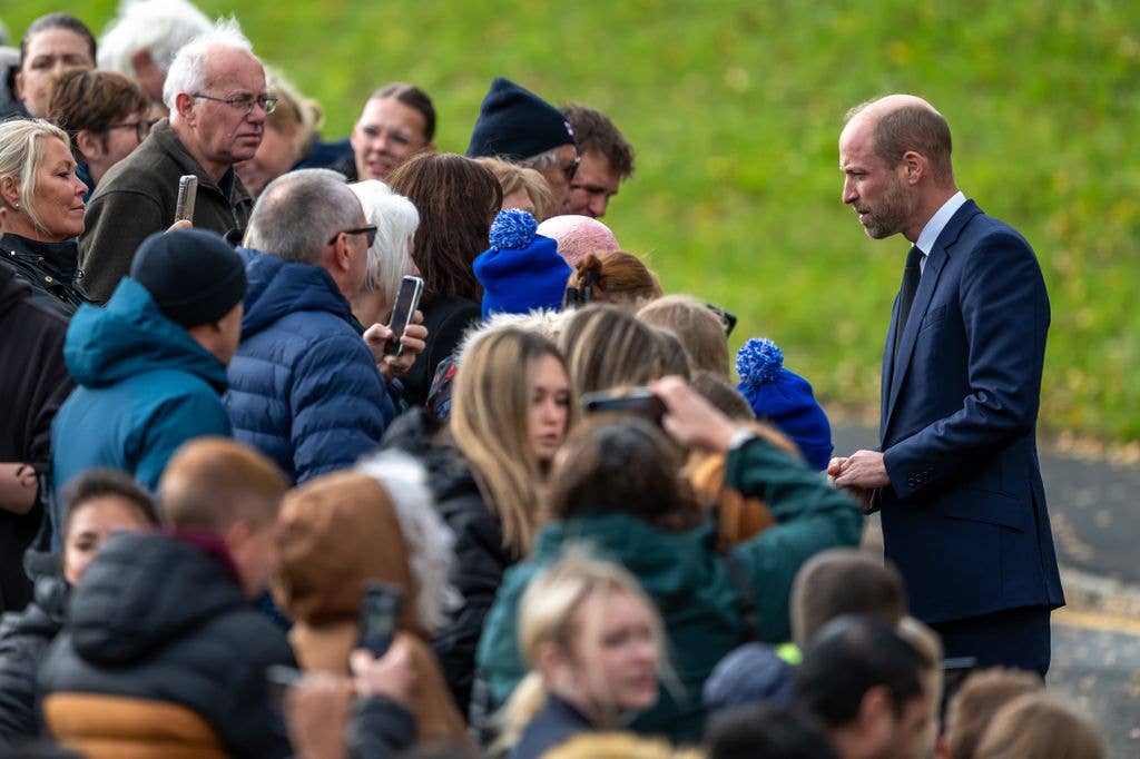 Prince William's futile struggle to escape eager royal fan caught on ...