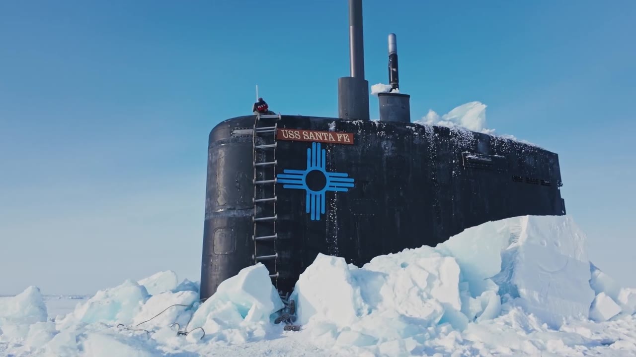 Watch a 7,000-ton US nuclear submarine break through 2 feet of Arctic ice