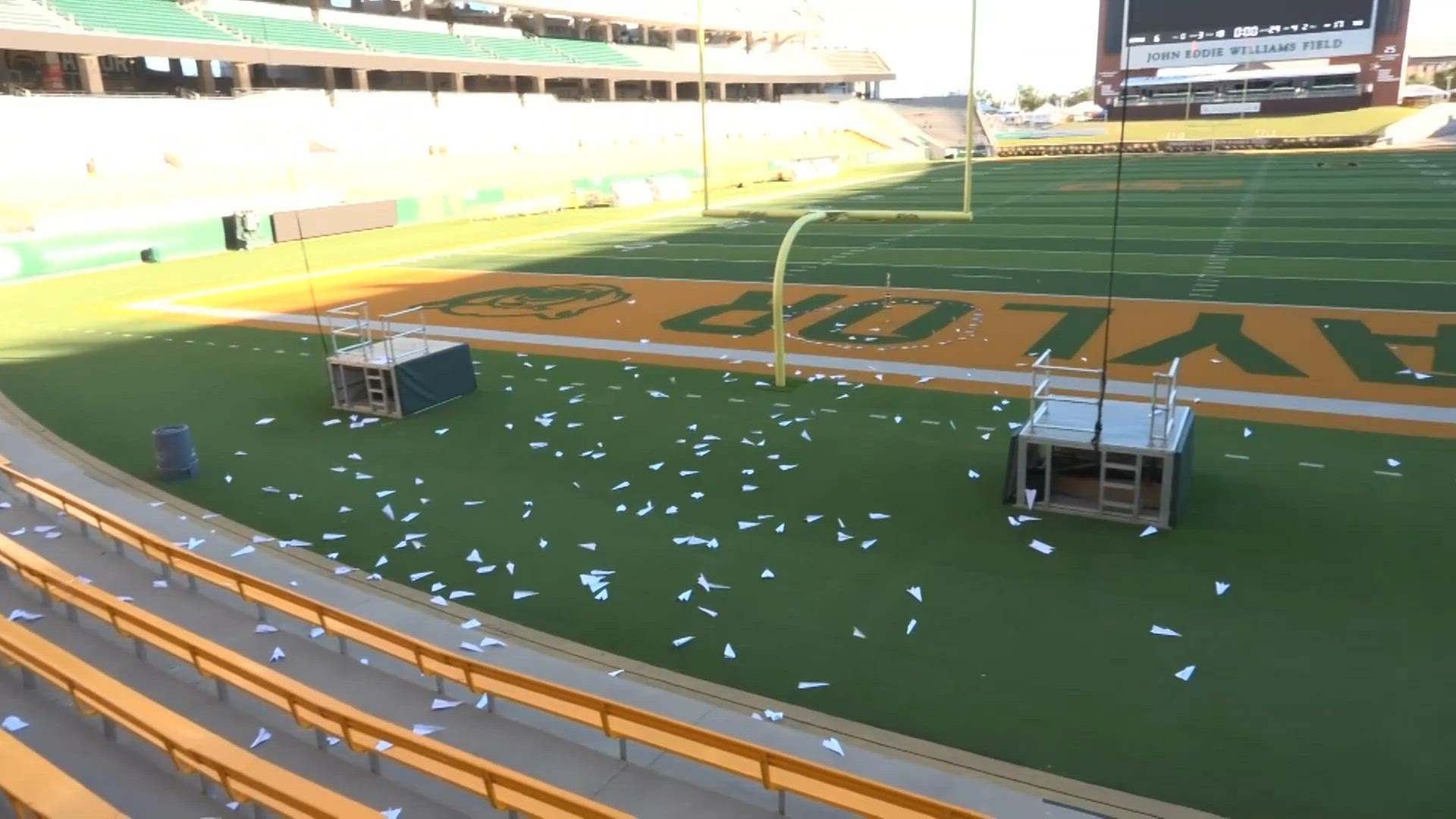 How far can a paper airplane fly? An entire stadium puts it to the test