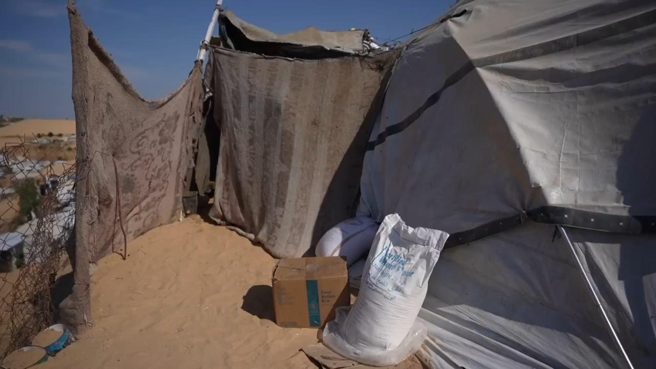 Palestinians in Gaza face worsening conditions as UN forced to slash ...