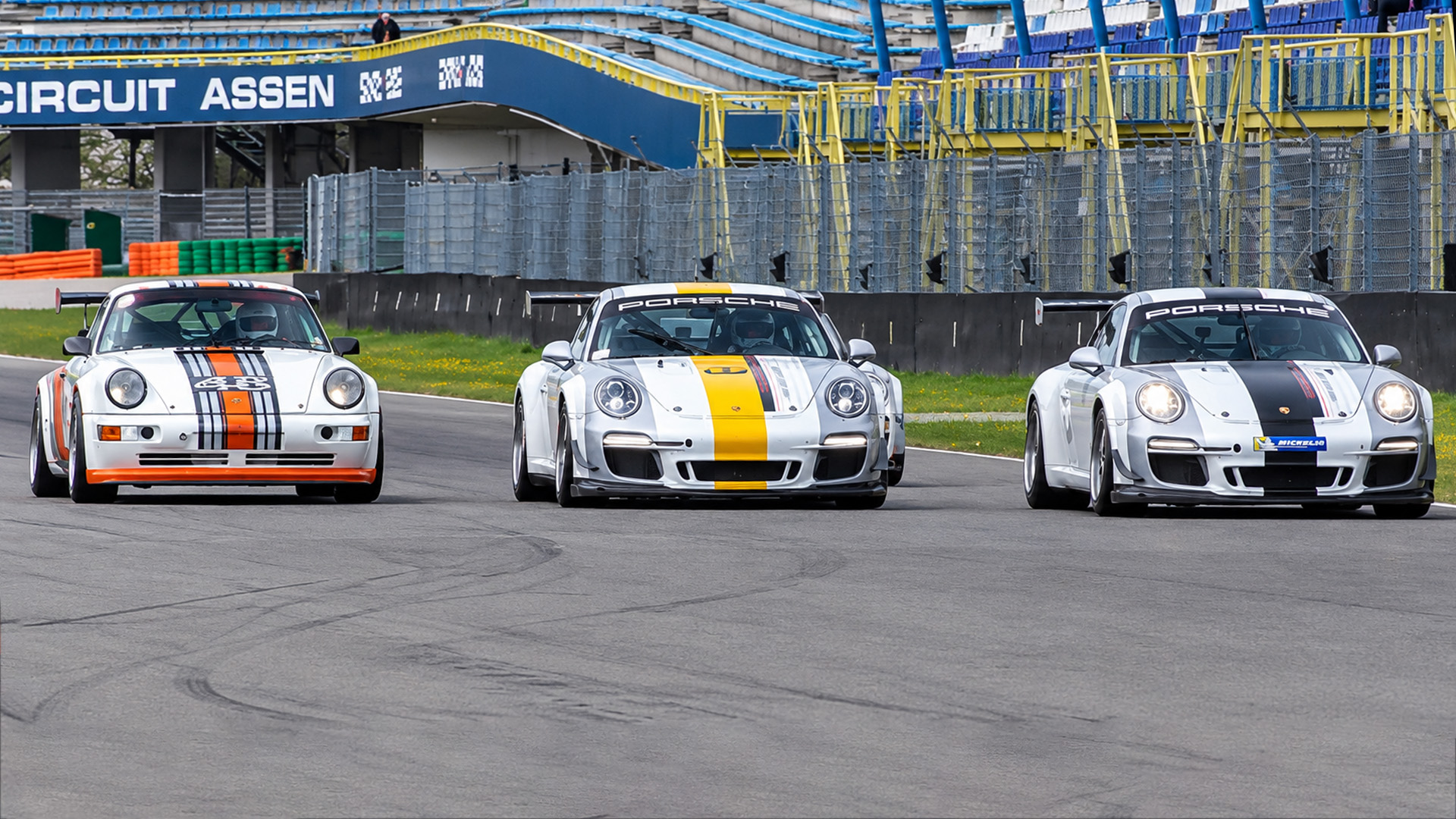 Porsche race car battles rivals at Assen Touristenfahrten