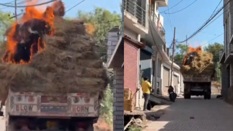 Watch: Burning truck drives through narrow lane as live wires hang ...