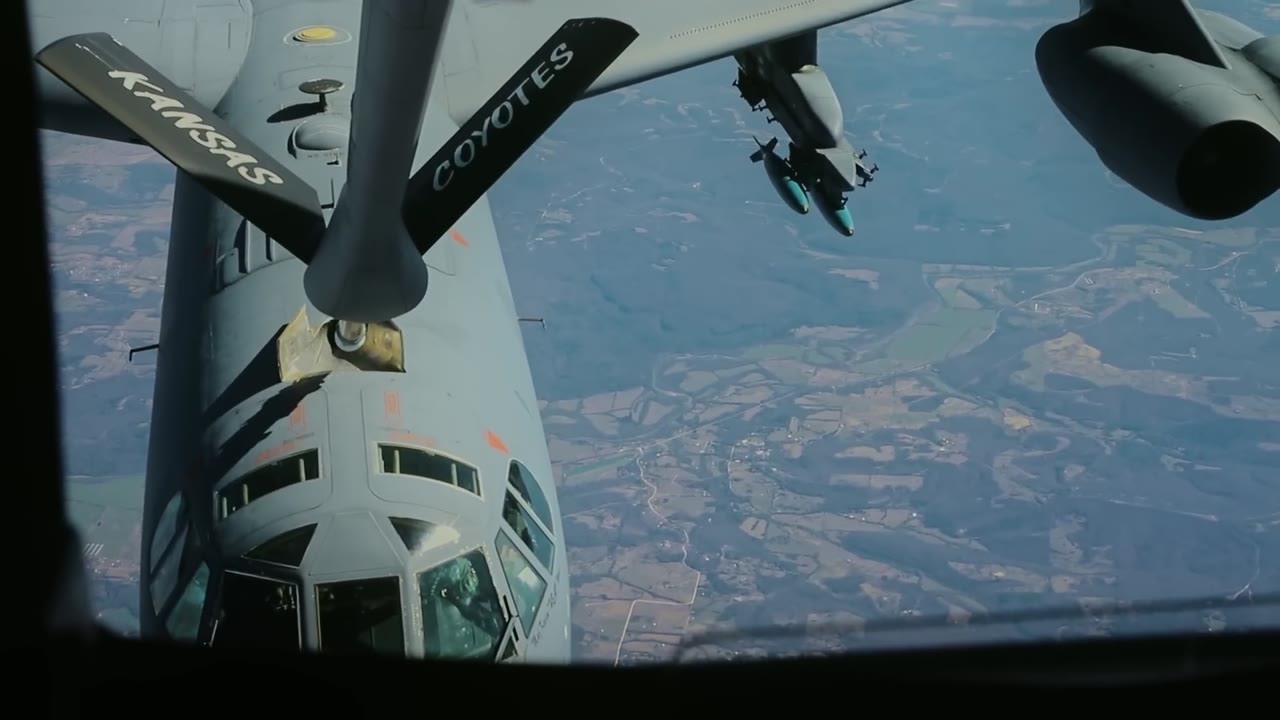 Watch an eight-engine US bomber release practice bombs over a military ...