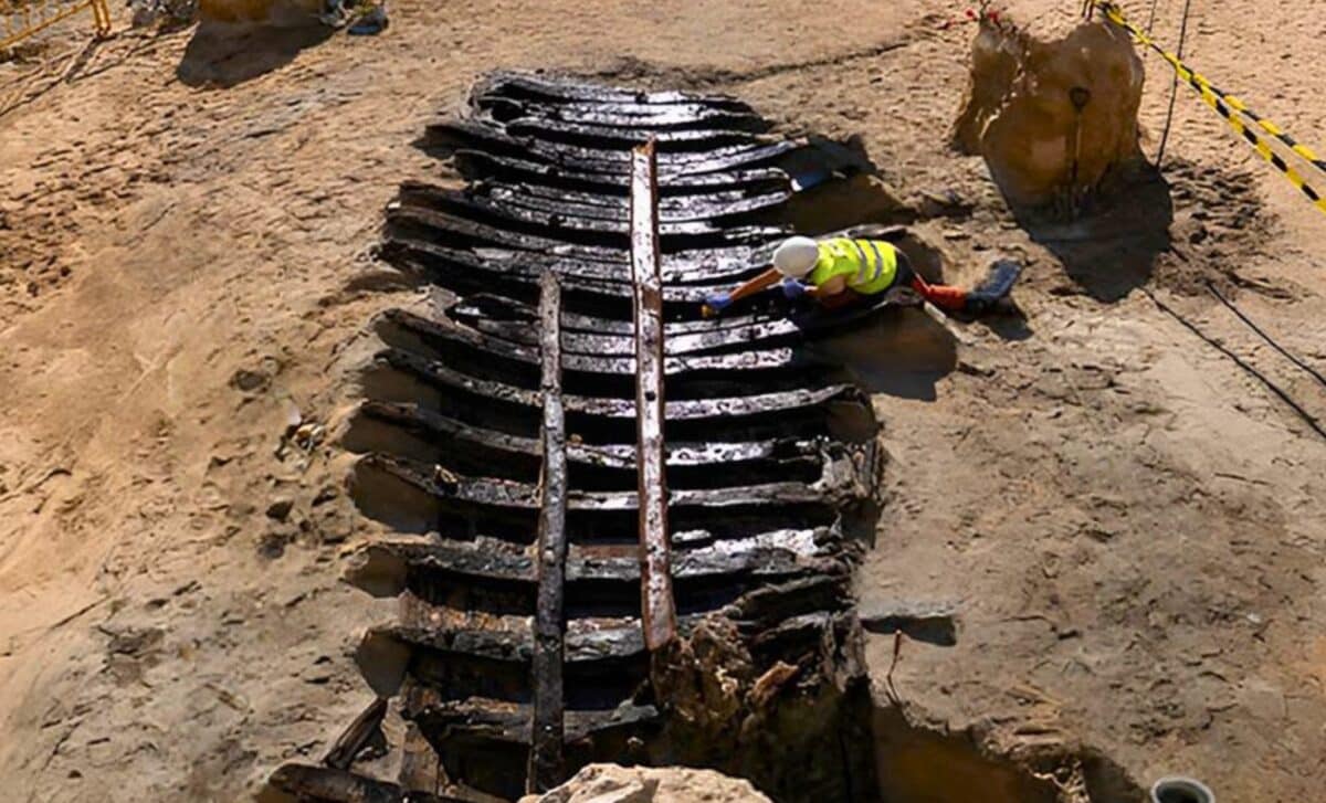 Construction workers unearth a 500-year-old ship buried beneath ...
