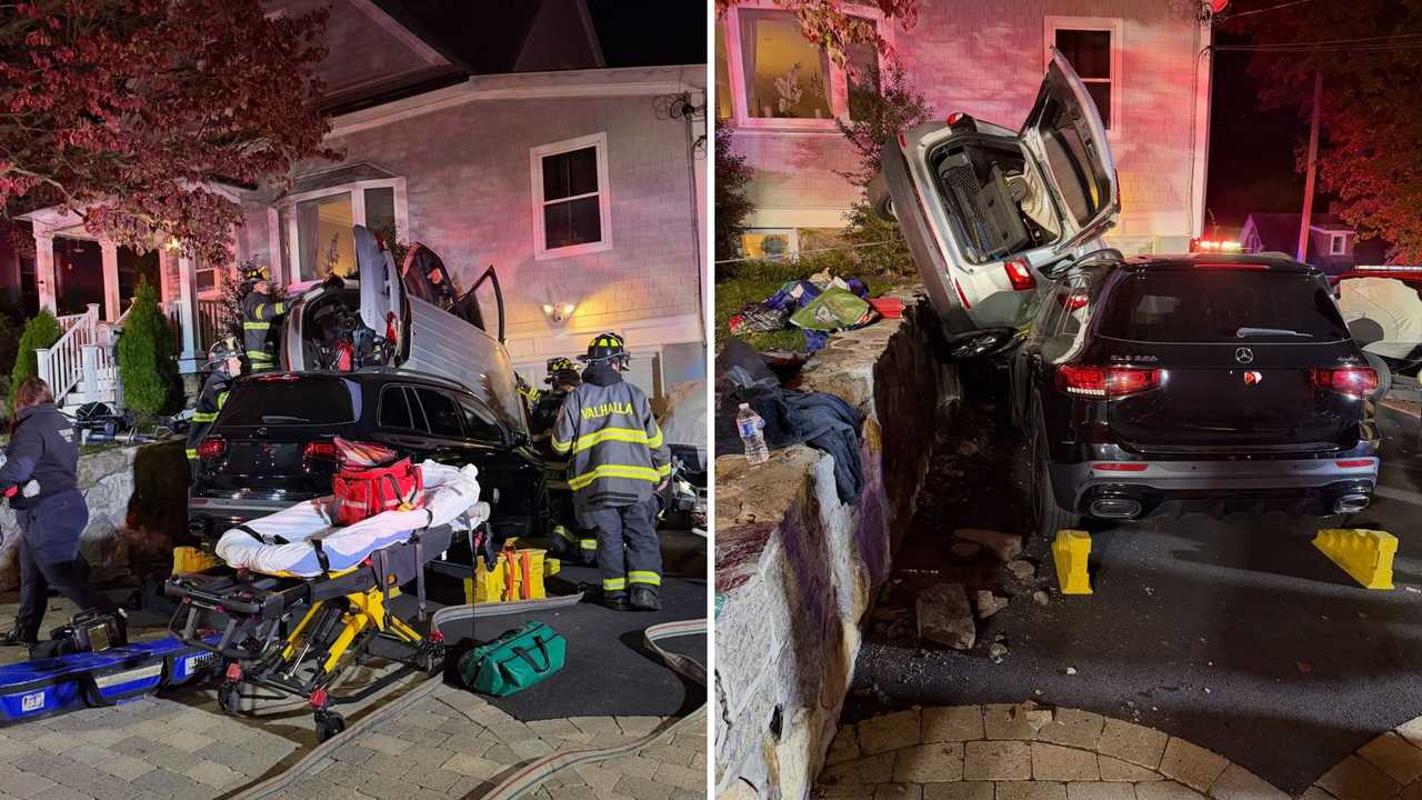 Car falls down rock wall into house, another vehicle in Westchester