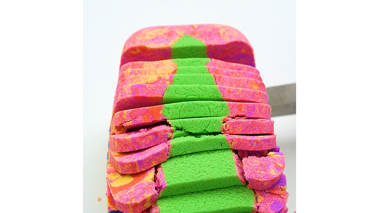 Satisfying slicing pink and green sand block with knife creating ...