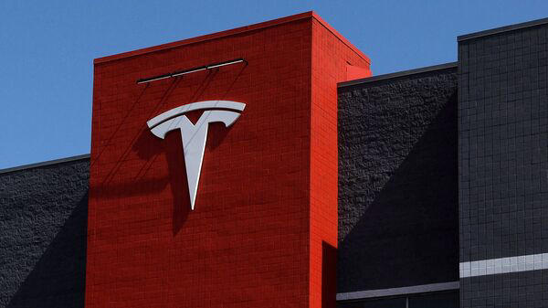 Tesla shares fall 4% in pre-market after capex forecast cut: Is Elon ...