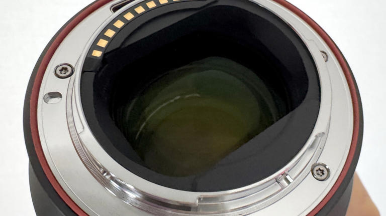 Should you clean both sides of a camera lens?