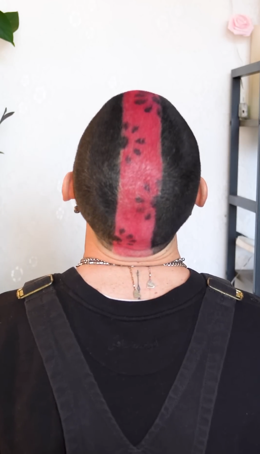 Floral hair dye art on a reverse mohawk
