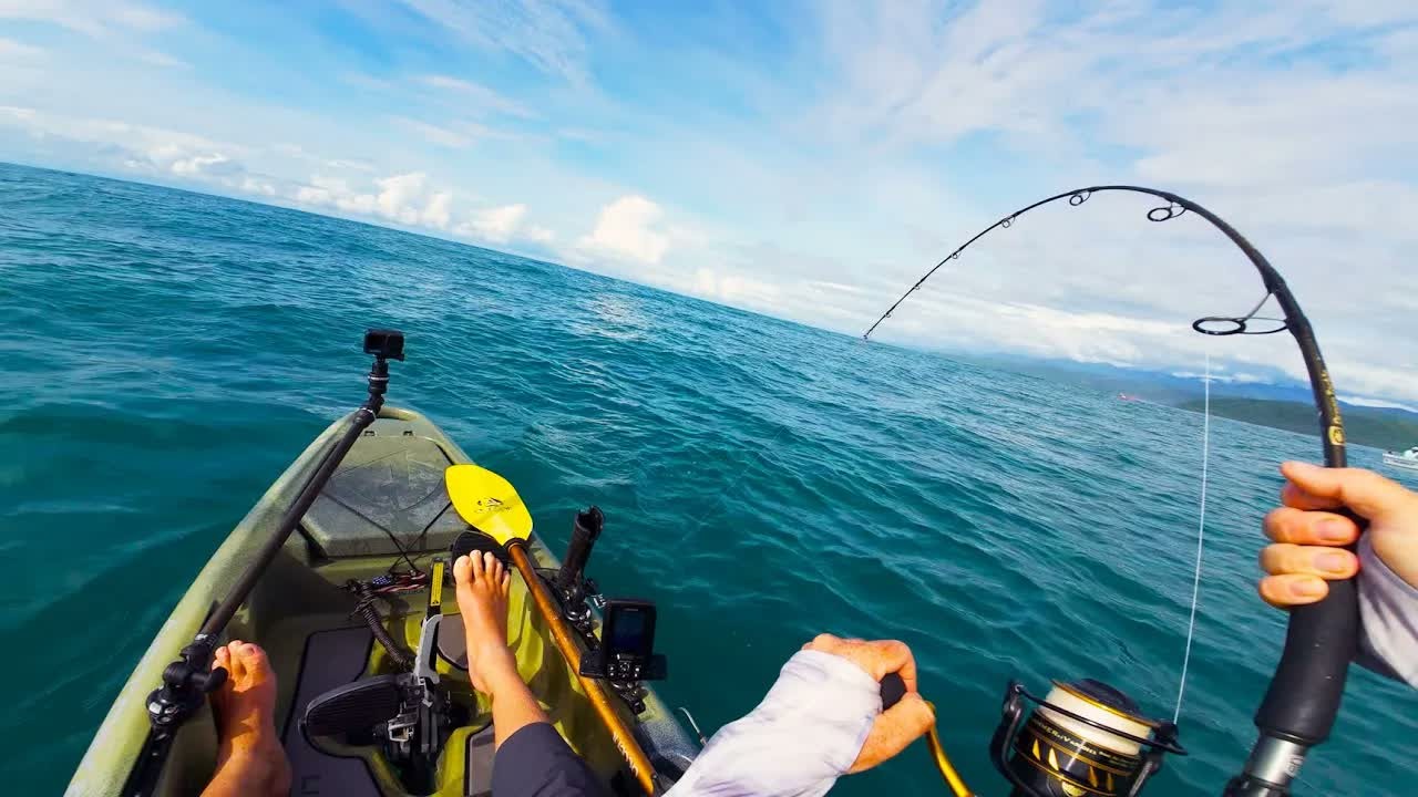 An offshore kayak angler catches multiple fish species on lures