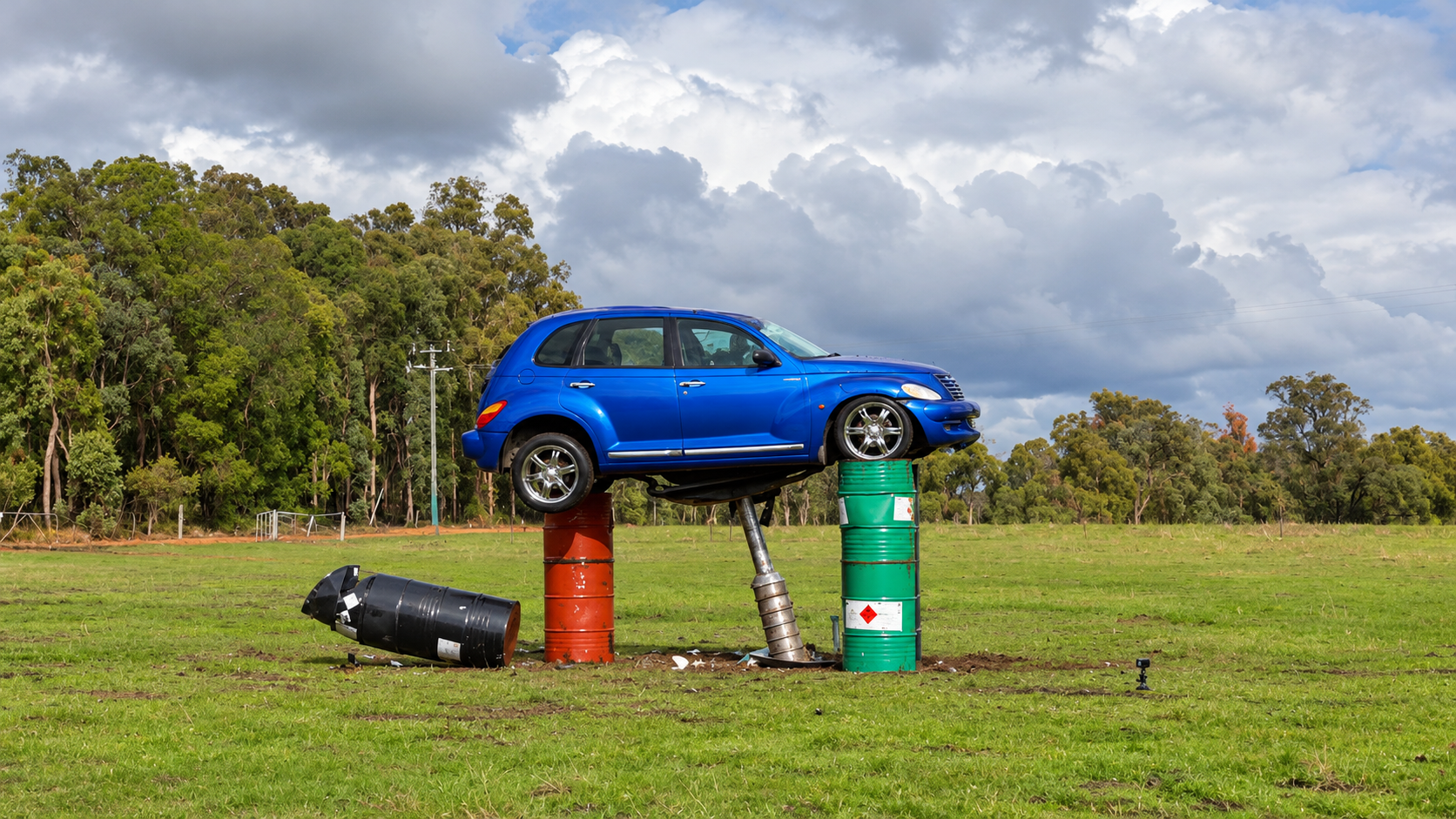 What happens when a giant dart hits a car from 200 feet?