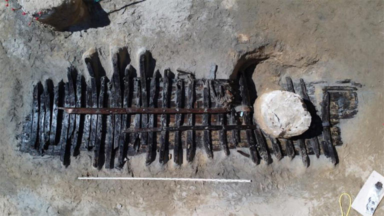 Construction workers unearth a 500-year-old ship buried beneath ...